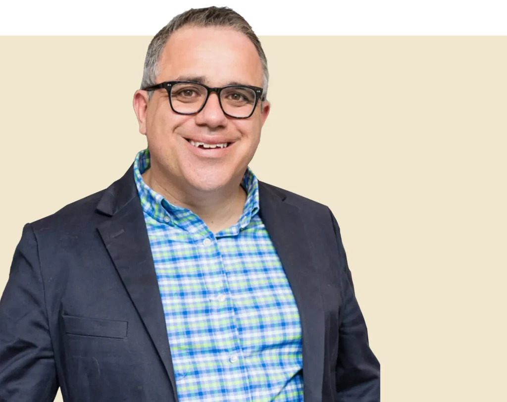 Ryan McKeen portrait picture with a beige background